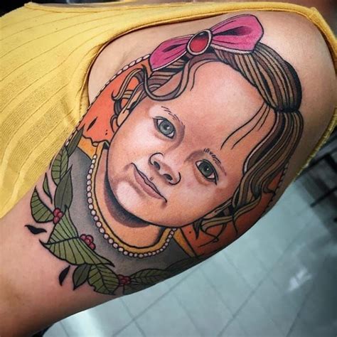 traditional illustrative portrait tattoo.